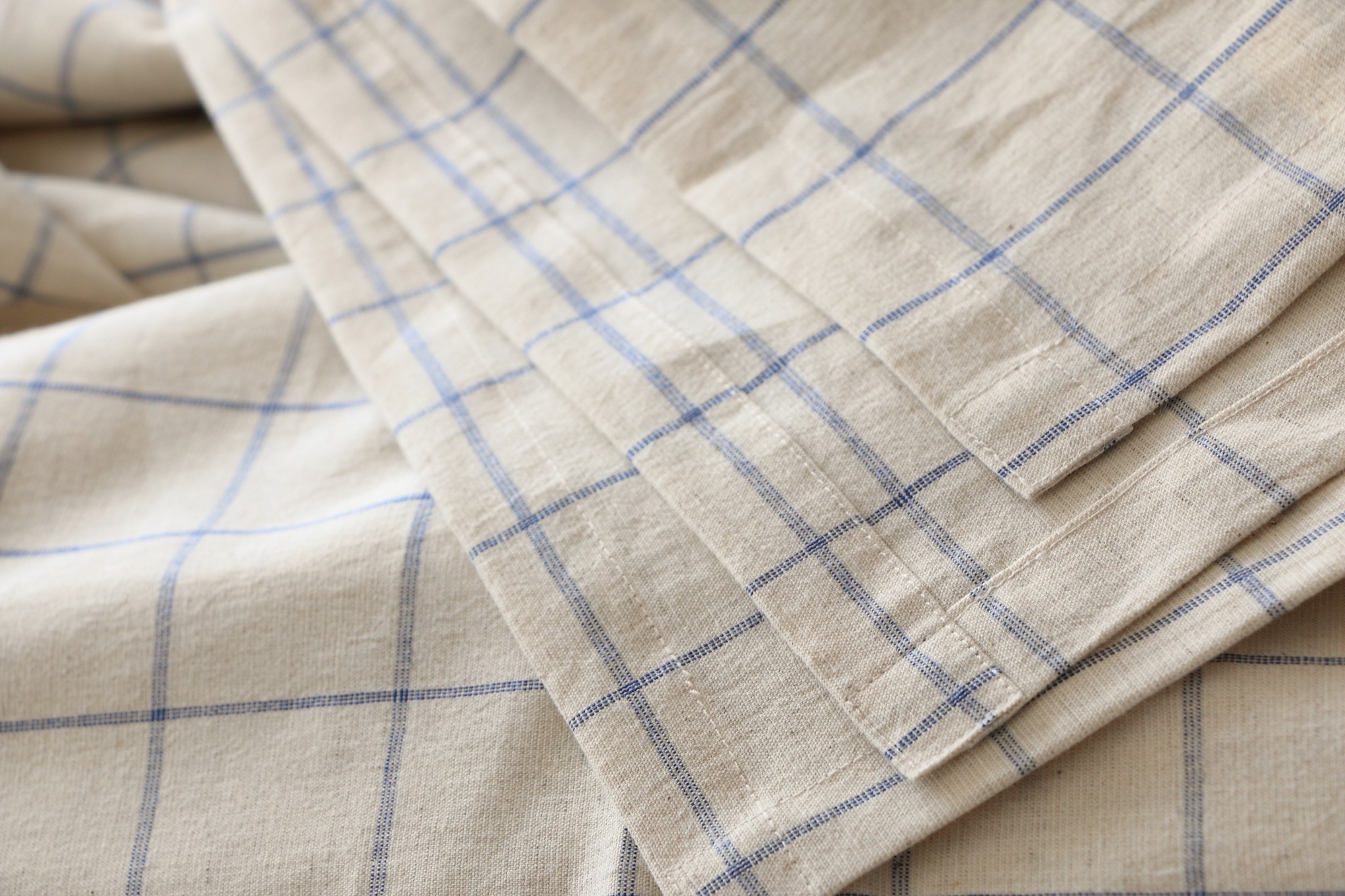 Careful stitching and seam finishing on a linen bedding piece